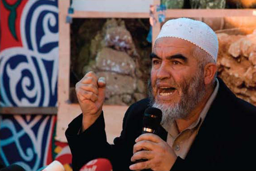 Sheikh Raed Salah, head of the northern branch of the Israeli Islamic Movement. He became the successor of Haj Amin al-Husseini, refurbished the "Al-Aksa is in danger" libel, incited violence, and promised to redeem Al-Aksa "in fire and blood." (Tara Todras-Whitehill, Associated Press)