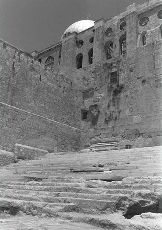At the foot of the Southern Wall the ancient steps leading to the western Hulda Gate, which served as an entrance to the Temple Mount in Second Temple days. The gates themselves were left sealed and Israel maintained a separation between the excavations near the walls and the surface area of the mount. (Ya'acov Sa'ar, Government Press Office)