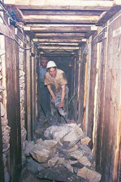 Workers of the Israel Religious Affairs Ministry at the start of the project to uncover the entire underground length of the Western Wall, early 1970s. The claim that Israel seeks to topple the Western Wall is absurd; Israel has acted to preserve and strengthen the wall. (courtesy of the Western Wall Heritage Foundation)