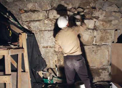 Reinforcement operations for existing recesses that were uncovered at the Western Wall Tunnel compound.