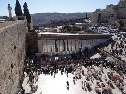 The temporary wooden bridge that Israel built to replace the collapsed ramp. It is not used by Muslim worshippers, who have many other entrances to the Temple Mount. The Mughrabi Gate is the sole entrance to the Temple Mount for Jews, tourists, and Israeli security forces since the Six-Day War. (Western Wall Heritage Foundation)