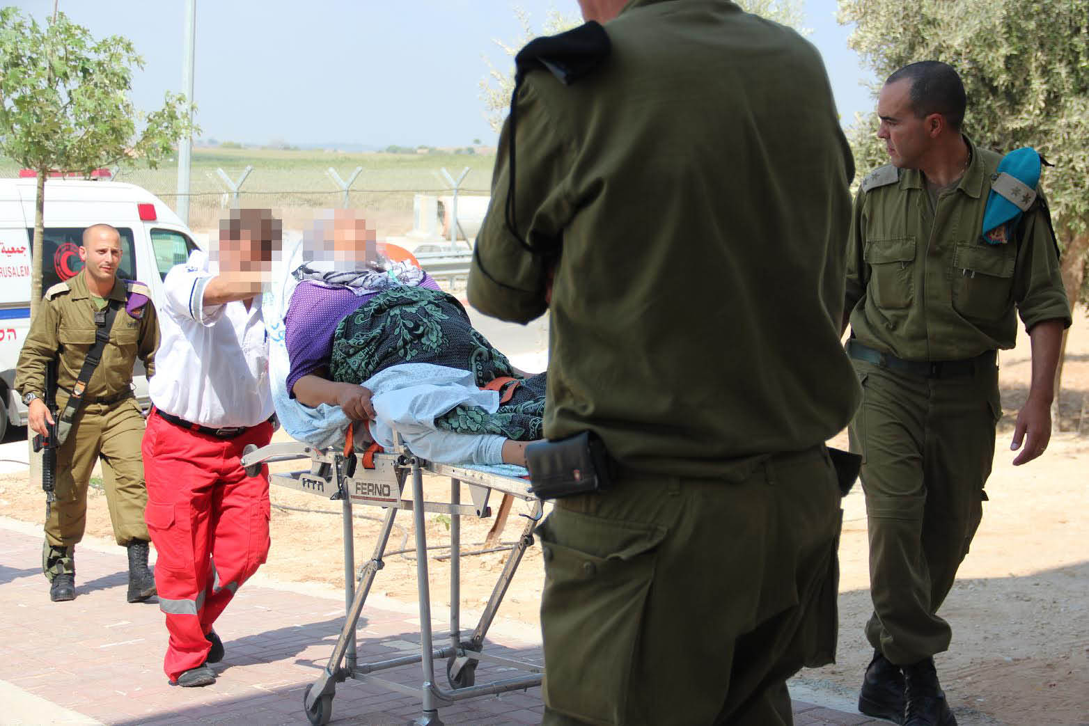  Israel and the Gaza Strip: Why Economic Sanctions Are Not Collective Punishment The IDF Medical Corps treating injured Palestinian civilians at the Erez Border Crossing. (IDF Flicker)