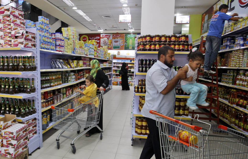  Israel and the Gaza Strip: Why Economic Sanctions Are Not Collective Punishment Palestinians shop at al-Andulusia mall in Gaza City on August 16, 2011. (AP/Hatem Moussa)