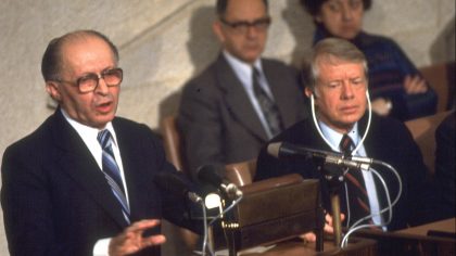 Menahem Begin delivering a speech at the Knesset in honor of Pres. Carter's visit.